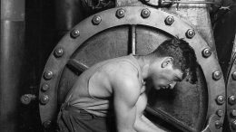 Lewis_Hine_Power_house_mechanic_working_on_steam_pump